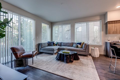 a living room with a couch and a table